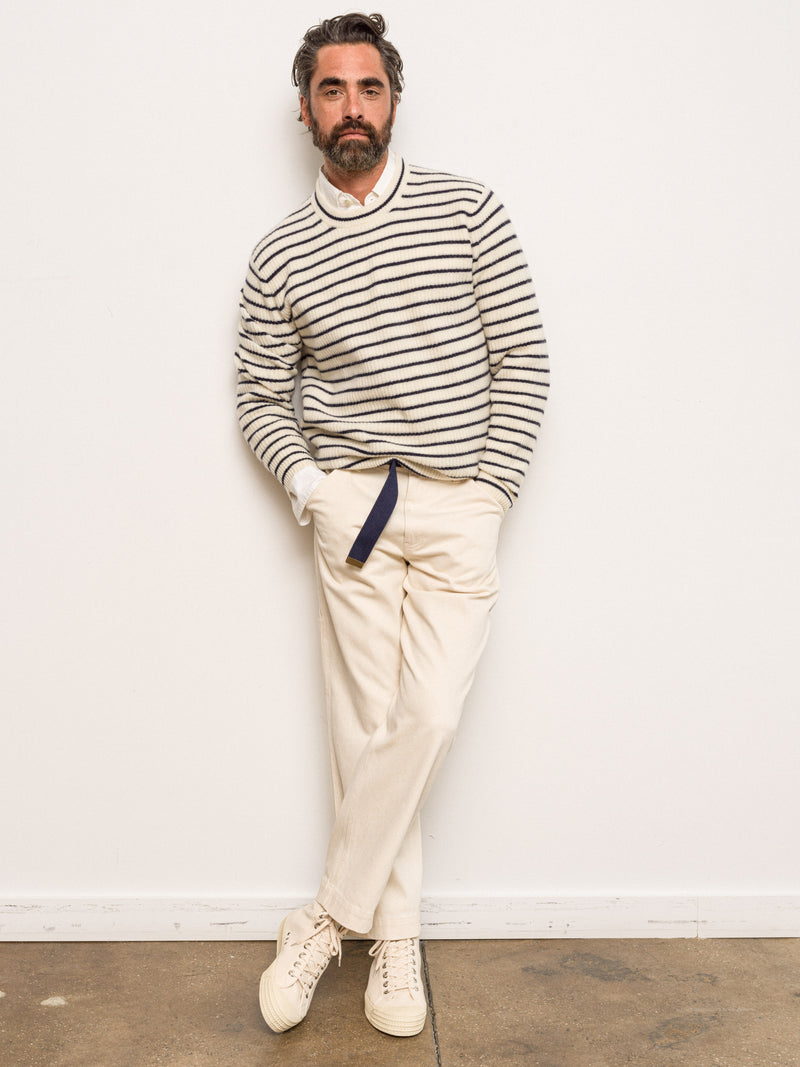 <p><em>The</em></p><p>Sweater</p>