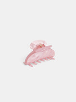 The Large Round Claw is a light pink, semi-translucent acetate hair accessory with interlocking teeth and a curved shape, shown on a plain white background.