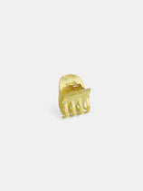 The Small Round Claw is a yellow, translucent acetate hair accessory with a curved shape and interlocking prongs, shown upright against a plain white background.