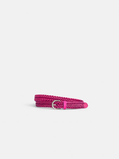 The Dragon Diffusion Woven Leather Belt, featuring a coiled, bright pink braided design and a shiny silver buckle, is displayed on a plain white background.