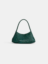 The Dragon Diffusion Rosanna is a dark green handbag made from vegetable-dyed, basket-woven leather with a single curved handle, shown against a plain white background.