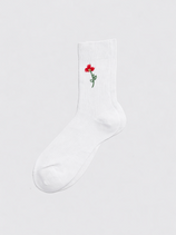Maria La Rosa Iris Socks: A single white Italian sock featuring a small red flower with a green stem embroidered on the side, displayed against a plain light background.