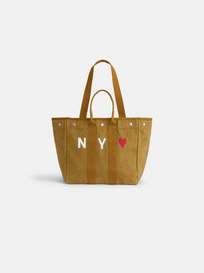 The NY <3 Painted Perfect Weekday Tote is a brown canvas bag with two handles, hand-painted by Brooklyn artists. It features "NY" and a red heart on the front, set against a plain white background.
