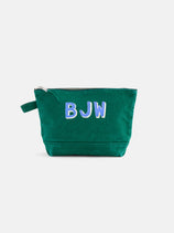 The Perfect Canvas Pouch is a durable makeup bag with a zipper and side strap, personalized with the letters BJW in white and blue on the front.