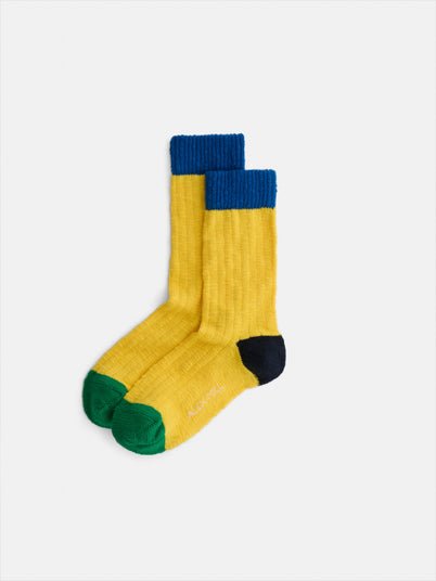 Cotton Colorblock Socks: Unisex yellow cotton socks with ribbed texture, blue cuffs, green toe caps, and black heels, displayed side by side on a white background.