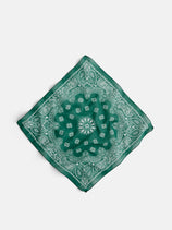 The Two Tone Bandana in Cotton is a vintage Italian-made piece in green cotton voile, featuring a white paisley and floral pattern, shown flat in a diamond shape on a plain white background.