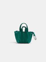 The Teeny Tiny Tote Keychain is a small green fabric tote with two handles, silver rivet details, visible stitching, and a metal keyring on one side, shown against a plain white background.