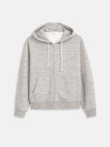 The 12th Street Zip Hoodie In Heather Fleece, shown on a plain white background, features a light gray heather fleece fabric, drawstring hood, and front pockets.