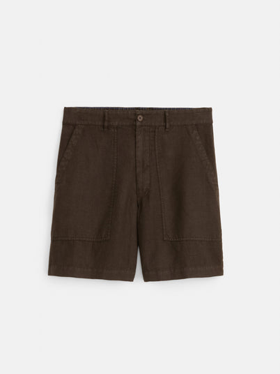 The Garment Dyed Pull On Field Short in Linen features natural brown flax linen, front patch pockets, belt loops, and a button closure—perfect summer shorts for effortless style, shown against a white background.