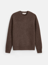 The Jordan Sweater In Washed Cashmere, a brown ribbed knit design with long sleeves and a crew neckline, is crafted from lightweight cashmere and displayed laid flat on a white background.