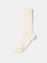 A pair of RoToTo Linen Cotton Ribbed Crew Socks in cream, made from sustainable yarns with a ribbed texture, is neatly laid flat on a plain white background.