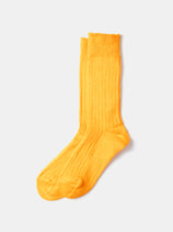A pair of RoToTo Linen Cotton Ribbed Crew Socks in bright orange, made in Japan, laid flat on a plain white background.