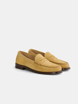 The New York Loafer Sister In Suede is an Italian-made tan suede loafer featuring handsewn stitching and low brown heels, showcased on a plain white background.