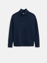 Maisie Turtleneck Sweater in Cashmere: Navy blue, 100% cashmere with long sleeves, ribbed cuffs and hem, relaxed fit. Shown on a white background for a luxurious look.