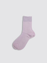 A single Maria La Rosa Bio Cotton Ribbed Sock in light purple with a ribbed texture and solid cuff, shown on a plain light gray background.